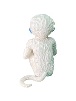 baby monkey plastic sculpture