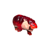 cherry cough drop hippo plastic sculpture