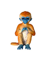 baby monkey plastic sculpture