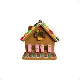 gingerbreadby house plastic sculpture